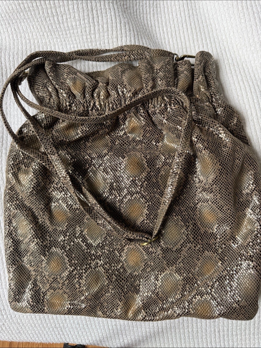 HOBO Brown Metallic Drawstring Shoulder Bag with Gold Accents